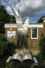 Seamus installing  “Celebration” stainless steel sculpture